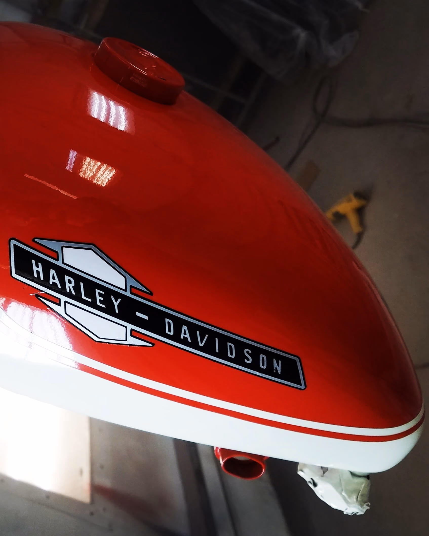 Harley-Davidson motorcycle gas tank with custom color paint job by JRB Autobody